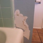 damaged bathroom wall